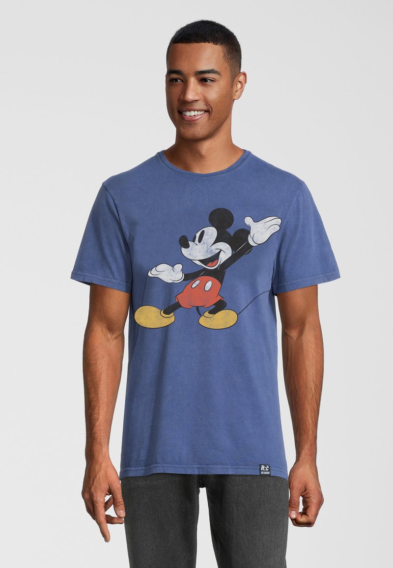 Modré bavlněné tričko se starožitnou grafikou Mickey Mouse v černé a červené barvě, s žlutýma botama, kulatým výstřihem a krátkými rukávy.