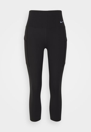 NIKE UNIVERSA WOMEN'S MEDIUM-SUPPORT HIGH-WAISTED CROPPED LEGGINGS WITH POCKETS - 3/4 sportsbukser - black/(black)