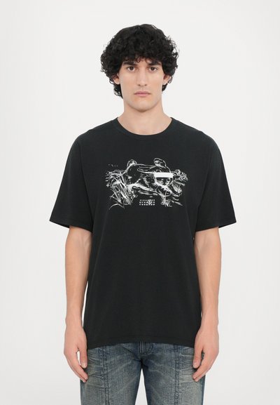 Black cotton t-shirt with short sleeves, featuring a white graphic print of animals and abstract elements on the front.