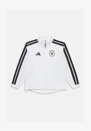 Biela bunda na celý zips s čiernymi pásikmi Adidas na rukávoch a logom nemeckého futbalového tímu so štyrmi hviezdami na hrudi.