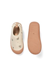 Kreemivärvi lükandid lillemustriga, kummist väliskumm, tekstuuriga tald ja elastne tõmblukk mugavaks kandmiseks.