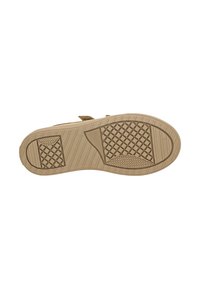 Semelle de chaussure en cuir avec des motifs de grip texturés, d'une forme arrondie et d'un design plat ; les caractéristiques comprennent une finition lisse et des détails texturés.