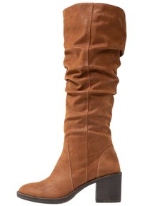 Slouchy brown faux leather knee-high boot with a textured finish, squared toe, and a chunky heel. Seam detailing along the sides.