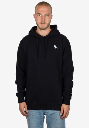 Zwarte hoodie met een voorzak in kangoeroestijl, voorzien van een kleine vogelafbeelding in wit en blauw op de linkerkant van de borst. Van katoen materiaal.