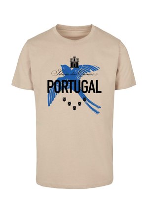 Beige Baumwoll-T-Shirt mit einem blauen Vogelgrafik, einer Krone und dem Text "PORTUGAL" in fetter Schrift, mit sechs kleinen Schilddesigns darunter.
