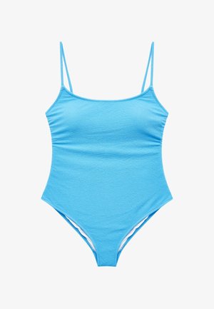 Maillot de bain une pièce bleu clair texturé avec fines bretelles et découpes hautes aux jambes, présenté sur fond blanc.