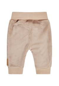 Weiche, beige Babyhosen mit elastischem Bund und Bündchen, aus plüschigem Stoff gefertigt, entworfen für Wärme und Komfort.