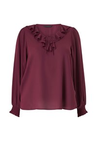 Bordeaux bluse med flæser ved halsudskæringen og bindedetalje, lange ærmer med samlede manchetter, lavet af let, glat stof.