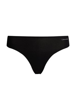 Black Calvin Klein thong, made of smooth fabric with a soft, wide waistband. Features subtle textured pattern and logo on the side.