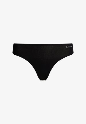 Tanga negro de Calvin Klein, hecho de una tela suave con una cinturilla ancha y suave. Presenta un sutil patrón texturizado y el logo en el lateral.