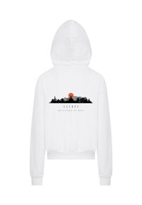 White hoodie featuring a graphic design on the back, depicting a skyline with a sun, accompanied by the text "ESCAP3 AND DISCOVER THE WORLD."