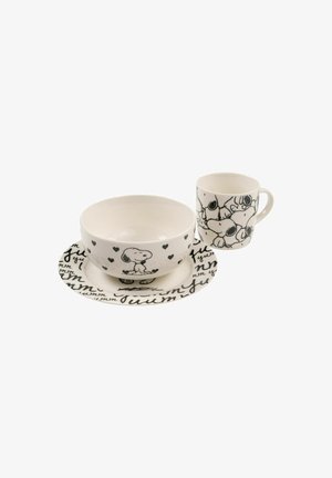 Ceramic bowl, cup, and plate set; white with black illustrations of dogs and text. Bowl features hearts; plate has repeating text pattern.