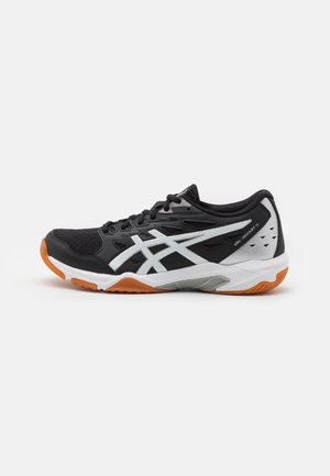 Chaussure de sport ASICS GEL-ROCKET 11 noire et blanche avec semelle orange, dessus en mesh et lacets, visible de profil sur fond blanc.
