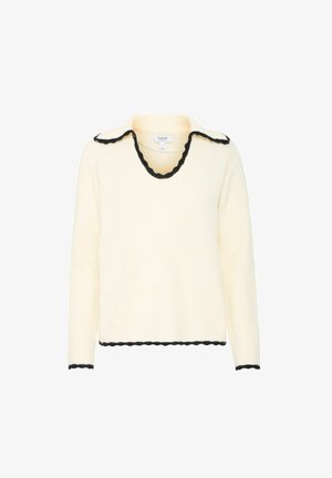 Creme farvet sweater med en bølget sort krave og kant, med lange ærmer og v-hals design. Fremstillet af et blødt, struktureret materiale.