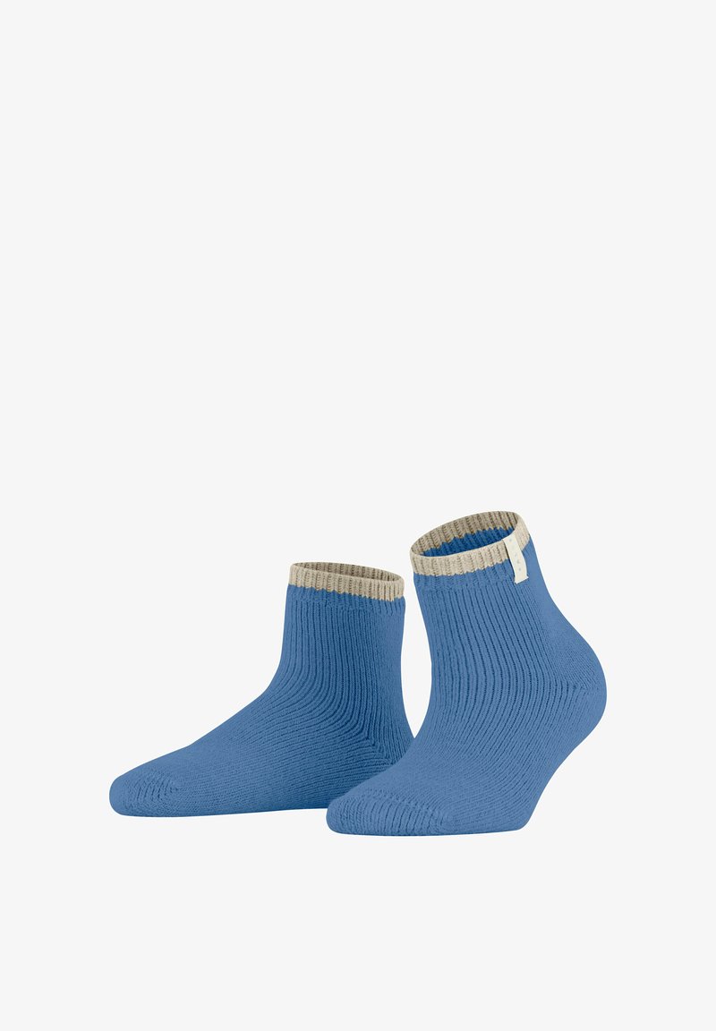 Niebieskie skarpetki kostkowe z rypsowym wzorem i kontrastującym beżowym mankietem. Miękki materiał o dopasowanym kształcie, odpowiednie do codziennego użytku.