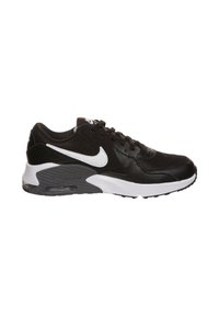 Sneaker nera con tomaia in mesh e pelle, dettagli bianchi, punta rotonda, lacci frontali e ammortizzazione Air Max visibile nella suola.