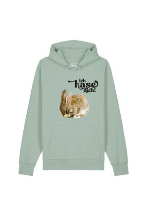 Hellgrüner Kapuzenpullover mit einer Grafik eines braunen Kaninchens und schwarzem deutschen Text darüber.