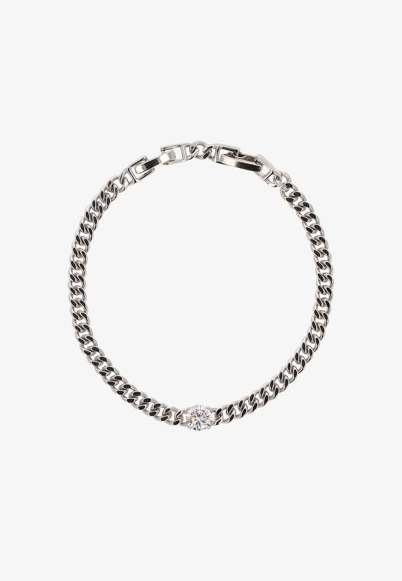 Ezüst színű fém lánc karkötő váltakozó lapos és kerek szemekkel, középen egy átlátszó kő díszítéssel. Simább textúrával és fényes felülettel rendelkezik.