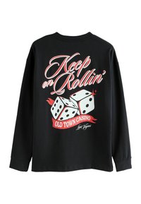 Czarna koszula z długim rękawem, z graficznym wzorem przedstawiającym białe kości do gry oraz czerwonym napisem "Keep on Rollin'" i "Old Town Casino, Las Vegas."