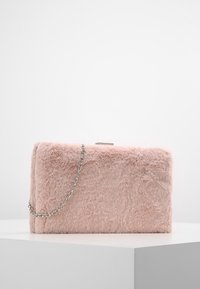 Pink faux fur handbag with a rectangular shape, silver chain, and a smooth texture. Features a metal clasp closure on top.