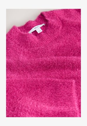 Karvane roosa kampsun pehme tekstuuriga, ümmarguse kraega ja ees taskuga. Sildil on kirjas "NEXT." Disainil on ühevärviline muster ilma täppideta.