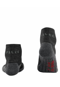 Calcetines de tobillo gris de canalé con el logo "FALKE" a los lados. Presentan una suela texturizada para mayor agarre y talón reforzado para una mayor durabilidad.