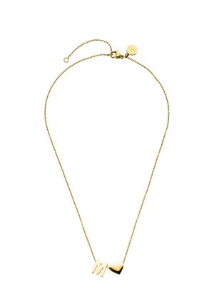 Gold chain necklace with a small letter "M" charm and a heart-shaped charm, featuring an adjustable clasp and extension chain.