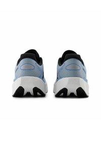 Pair of blue and black running shoes with white thick soles shown from the back on a white background.