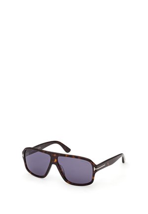 Obdélníkové sluneční brýle s želvovinovým vzorem, tmavými čočkami a tenkými stříbrnými akcenty na stranicích.