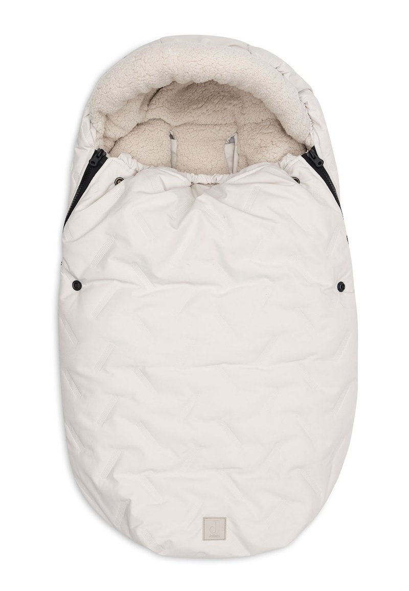 Gevoerde beige voetenzak voor de babywagen met fleece voering en ritsen aan beide zijden, ontworpen voor warmte en comfort.