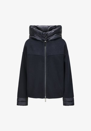 Black zip-up jacket with padded high collar and cuffs, featuring a smooth upper section and wool-textured body and sleeves.