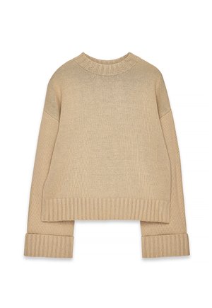 Beige knitted sweater with ribbed crew neck, cuffs, and hem, featuring long sleeves and a slightly oversized fit.