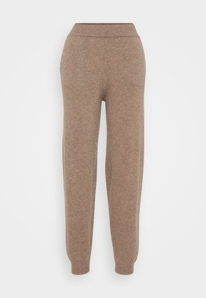Pantaloni della tuta lavorati a maglia marroni con vita e polsini a coste, caratterizzati da una texture morbida e un design affusolato per una vestibilità rilassata.