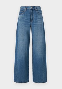 Jeanși largi, de culoare albastră, cu o spălare medie, având talie înaltă, cinci buzunare și o ușoară denivelare. Realizați din denim cu o textură netedă.