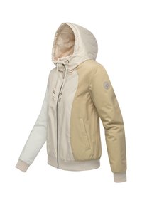 Hooded jacket featuring a mix of beige and light gray colors, smooth material, diagonal panels, and elastic cuffs with a zip closure.