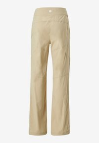 Beige outdoor broeken met een rechtlopende pasvorm, gemaakt van lichtgewicht stof. Voorzien van stikdetails en een klein logo nabij de zoom.