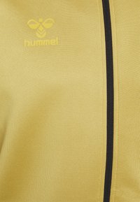 Hummel JACKET - Trainingsjacke - antique gold