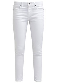 Bílé bavlněné džíny s úzkým střihem, které mají standardní pětikusový design, zipový klouzavý a knoflíkovou příclosure. Hladký povrch bez vzorů.