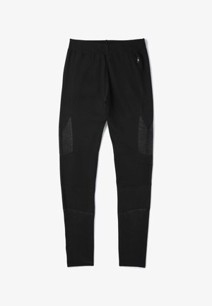 Czarne legginsy wykonane z elastycznego materiału z siateczkowymi panelami po bokach oraz dopasowanym krojem, z elastycznym paskiem w talii dla wygody.