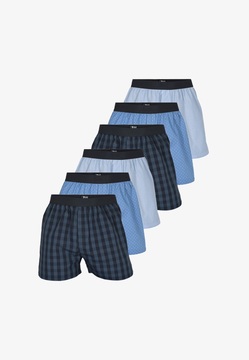 Boxershortset in verschillende blauwe patronen, waaronder geruit, gestreept en met stippen. Elastische tailleband, katoenen materiaal, vijf ontwerpen gepresenteerd.