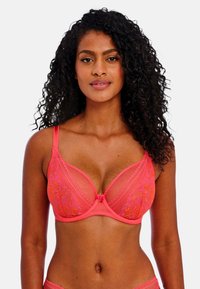 Roze kanten beha met beugel, voorzien van mesh cups, bloemenborduursel, verstelbare banden en een klein strikdetail aan de voorkant.