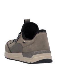 Gray suede sneaker with black accents, padded collar, and textured side panel. Features a grey rubber sole and adjustable lace system.