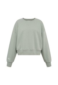 Maglione cropped verde chiaro con un pannello superiore testurizzato, polsini e orlo a coste. Presenta un piccolo logo bianco sulla manica sinistra.