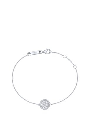 Delicate silver chain bracelet with a circular cluster of small diamonds in the center and a lobster clasp with a brand tag.