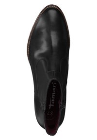 Botte de cheville en cuir noir avec bout arrondi, fermeture éclair sur le côté et semelle cousue marron, taille 37 visible à l'intérieur.