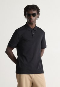 BOSS - Polo shirt - black Thumbnail Image 1