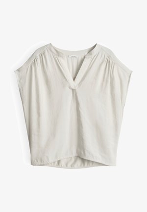 Loose white short-sleeve blouse with V-neckline and gathered fabric details at shoulder seams.