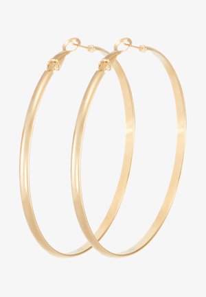 Kultaiset metalliset korvakorut, joissa on sileä ja kiiltävä pinta. Jokaisessa korviksessa on turvallinen kiinnitys, pyöreä muoto ja kohtuullinen paksuus.