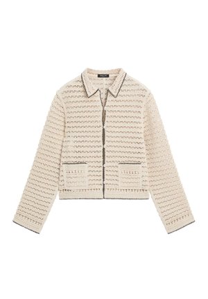 Beige gehäkelte Strickjacke mit langen Ärmeln, zwei Fronttaschen und schwarzem Besatz am Kragen, an den Taschenrändern, den Bündchen und der Reißverschlusslinie.