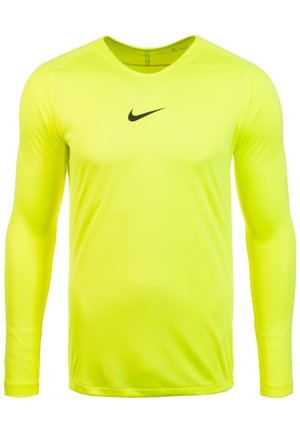 Langärmliges Sportoberteil aus leuchtend gelbem Stoff, mit rundem Halsausschnitt und einem schwarzen Nike-Logo auf der Brust. Glatte Textur.